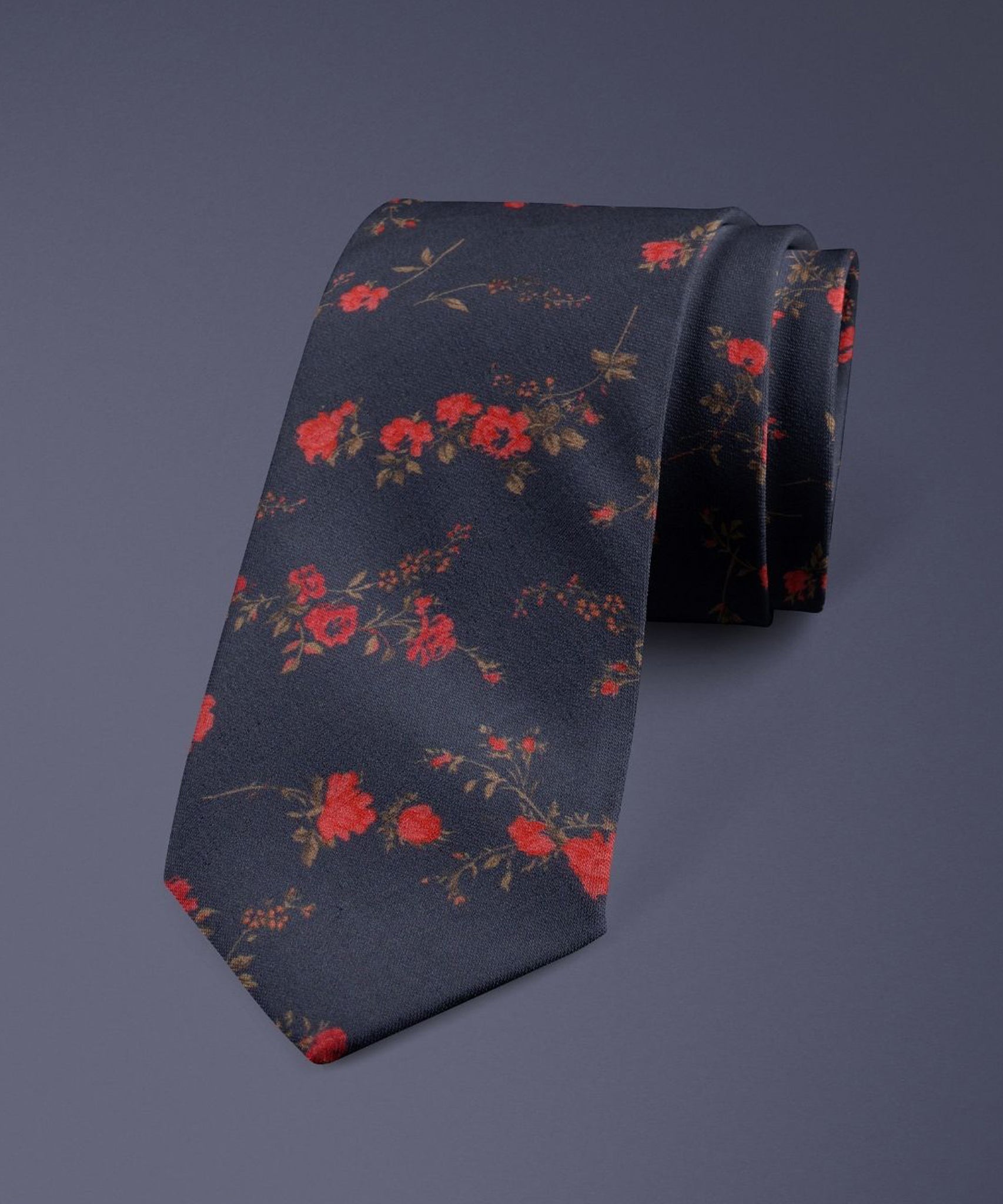 Elegant Liberty Fabric Tie and matching pocket square in lightweight cotton, showcasing the Elizabeth floral print with intricate trailing roses in subtle pastel pinks, leafy greens and warm accents, perfect for Wedding wear, formal events, Groom looks by Black Tie Menswear.